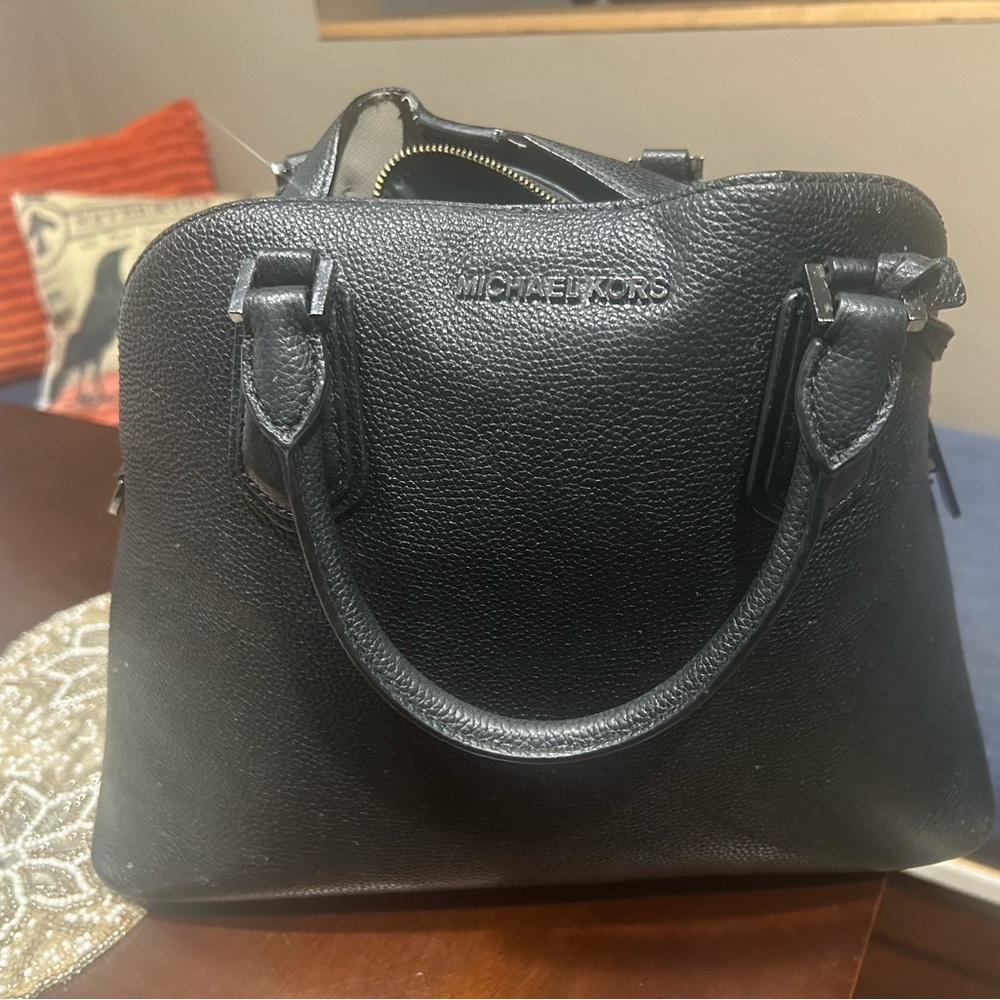 Michael Kors Adele large dome gunmetal black out. Good used condition.